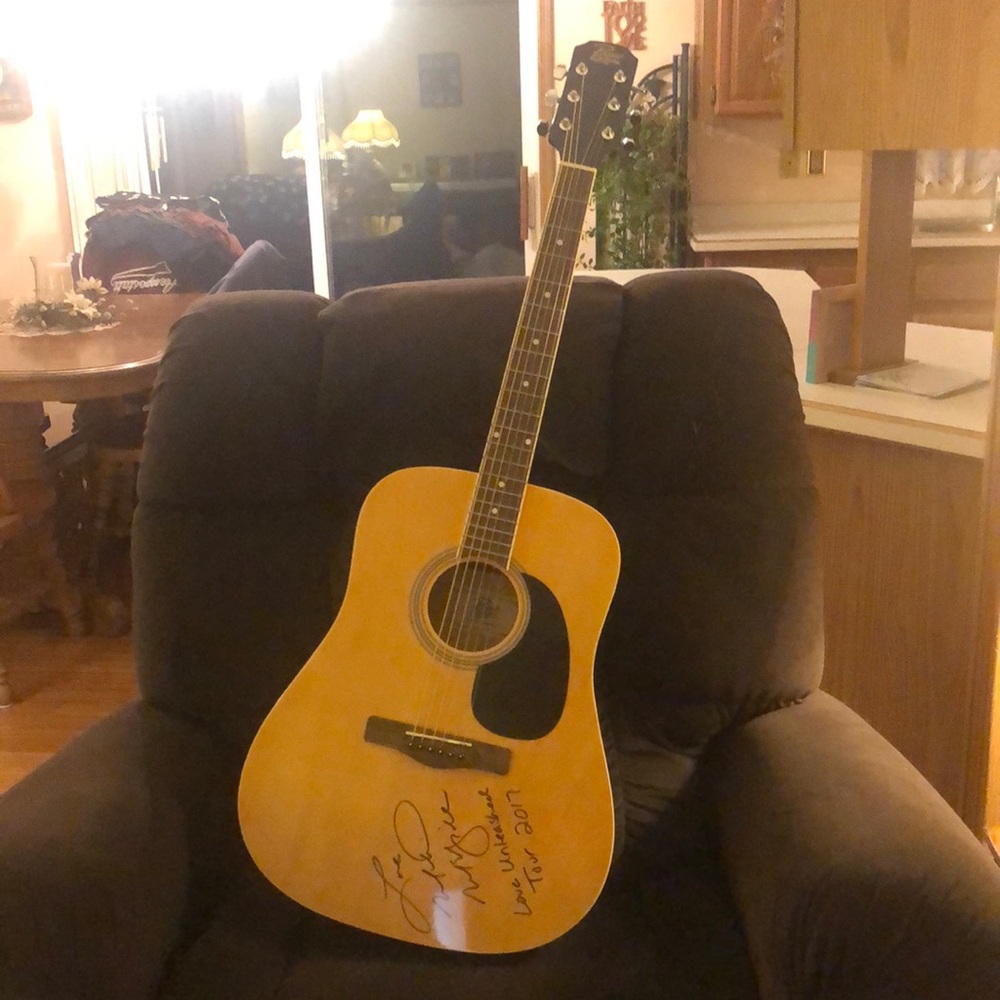 Rogue acoustic guitar signed by Martina McBride